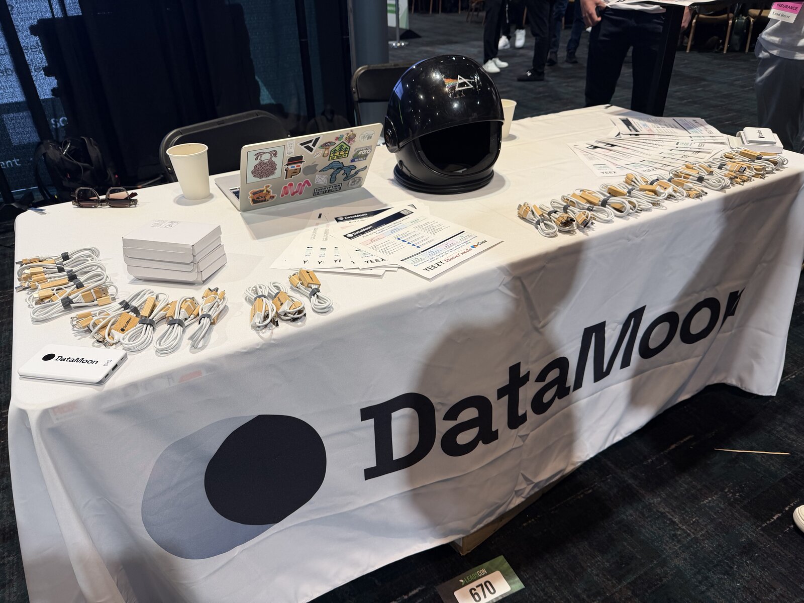 DataMoon booth setup with branded merchandise